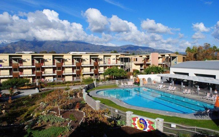 view of pool and pitzer hall